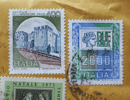 ROME, ITALY - CIRCA JULY 2017: stamps printed by Italy showing a castle andthe emblem of Italy