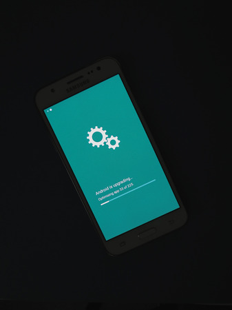 MOUNTAIN VIEW, USA - CIRCA APRIL 2017: Android OS installing system update on a smartphone mobile deviceのeditorial素材