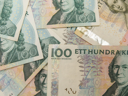 Swedish currency SEK from Sweden over blue backgroundの写真素材