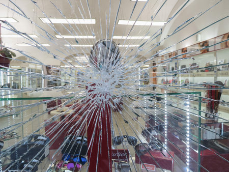 PRAGUE, CZECH REPUBLIC - CIRCA DECEMBER 2017: Broken glass window useful as a background