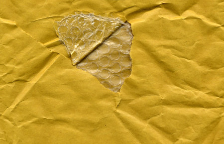 beige paper with bubble wrap texture useful as a background