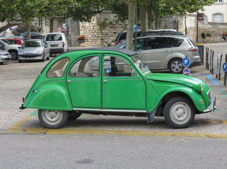 CARCASSONNE, FRANCE - CIRCA AUGUST 2018: green Citroen 2cv car