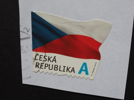 PRAGUE, CZECH REPUBLIC - CIRCA AUGUST 2018: a stamp printed by Czech Republic showing the flag of the Czech Republicの写真素材