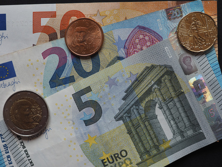 Euro banknotes and coins (EUR), currency of European Union, released by Franceの写真素材