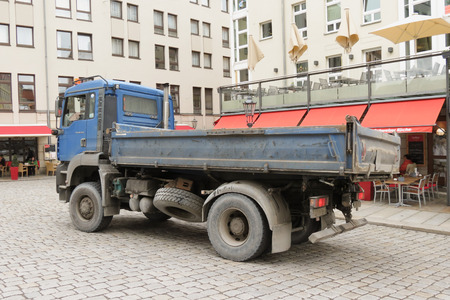 DRESDEN, GERMANY- CIRCA MARCH 2016: old blue dump truck in the very city centreのeditorial素材