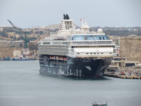 VALLETTA, MALTA - CIRCA MAY 2019: Mein Schiff Herz cruise ship operated by TUI Cruises moored at Valletta's harbourのeditorial素材