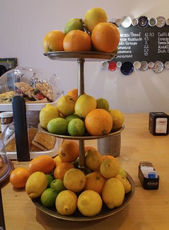 VALLETTA, MALTA - CIRCA MAY 2019: yellow lemon (Citrus x limon), oranges and green limes fruit vegetarian foodのeditorial素材