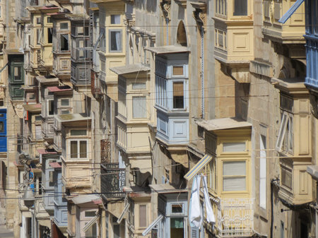 VALLETTA, MALTA - CIRCA MAY 2019: XVIII century wooden balconies in Republic streetのeditorial素材