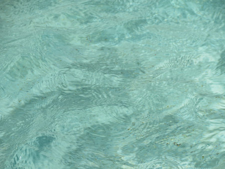 light blue water surface useful as a background