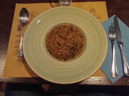 FLORENCE, ITALY - CIRCA APRIL 2019: ribollita meaning reboiled is a Tuscan soup made with bread and vegetables including leftover breadのeditorial素材