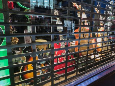 LONDON, UK - CIRCA NOVEMBER 2019: electric guitasr string music instruments on display for saleのeditorial素材