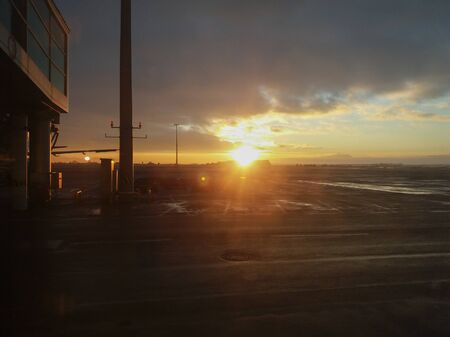 PRAGUE - CIRCA DECEMBER 2017: sunset on the runway at the airport in Pragueのeditorial素材