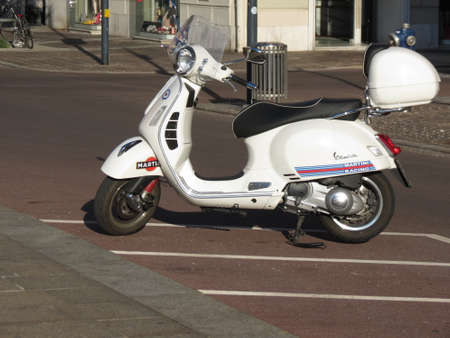 VIENNA, AUSTRIA - CIRCA JULY 2020: white Italian Vespa scooter motorcycleのeditorial素材
