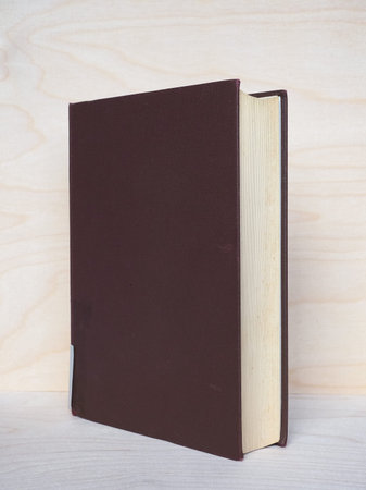 a hardback book with brown hard cover