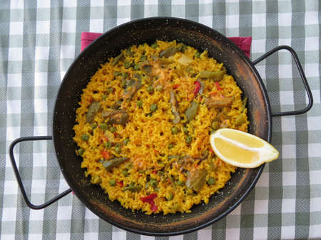 vegan paella valenciana, rice dish traditional from Valencia, Spainの写真素材
