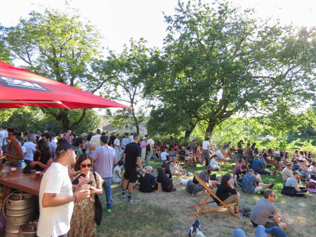 SANTIAGO DE COMPOSTELA, SPAIN - CIRCA SEPTEMBER 2022: crowd gathering at a techno party outdoorsのeditorial素材