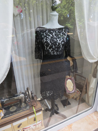 VICENZA, ITALY - CIRCA JULY 2022: old times taylor workshop windowの写真素材