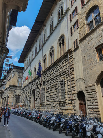 FLORENCE, ITALY - JULY 14, 2023: row of motorbikes parked in a street of the city centre - via del Proconsoloのeditorial素材