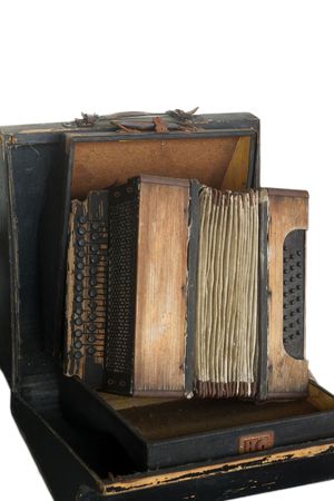 old accordion in a box, isolatedの写真素材