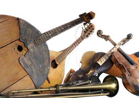 old broken music instruments isolatedの写真素材