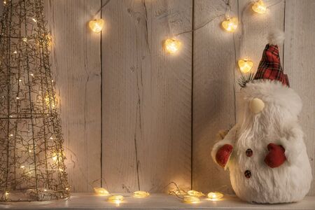 a background for Christmas texts with lights and gnomesの写真素材