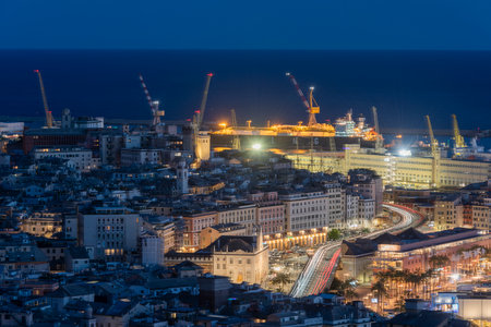 The city of Genoa, panoramic view of the center in the eveningの写真素材