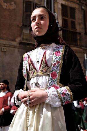 Cagliari/Italy - may 1, 2016: 360Â° Sant'Efisio folk and religious procession, young girl in traditional costumeのeditorial素材