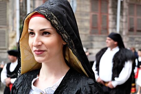 Cagliari/Italy - may 1, 2016: 360Â° Sant'Efisio folk and religious procession, nice girl smilingのeditorial素材