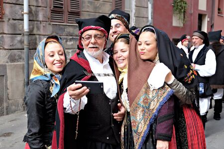 Cagliari/Italy - may 1, 2016: 360Â° Sant'Efisio folk and religious procession, group of people pose  for a selfieのeditorial素材