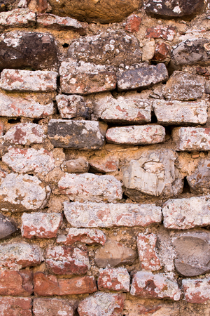 Light Brown brick wall background texture, old bricks rusty wall of ancient cityの写真素材
