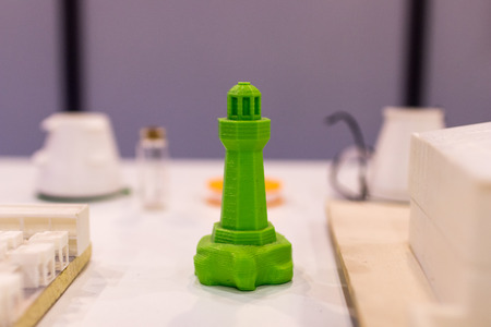 green lighthouse printed in 3d. Proof of 3D printing using a three-dimensional model of a lighthouseの写真素材