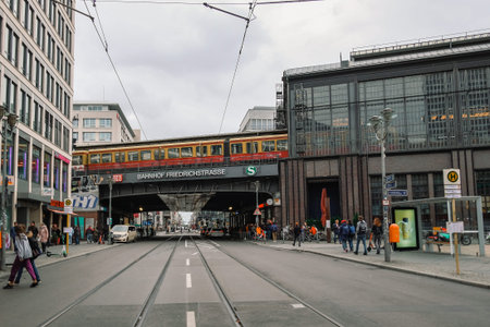 Berlin city street life mood with traffic, people and db train stop,transport