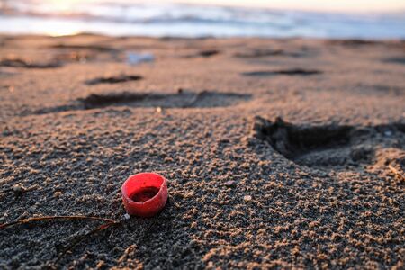 Micro plastic sea coast pollution, plastics garbage free ecosystem planet save conceptの写真素材