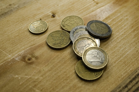 Euro coins on a table,drop money,economy business