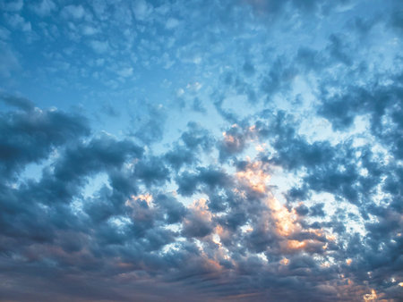 Impressive cloudy multicolored sunset sky field background,pattern wallpaper