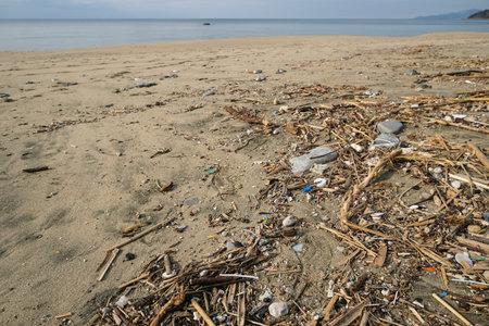 Micro Plastic waste dump on ocean sea coast,polluted ecosystem after a storm
