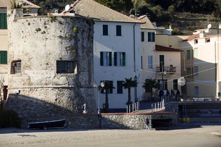 Laigueglia (SV), Italy - February 15, 2017: Laigueglia beach with old houses, Riviera dei Fiori, Savona, Liguria, Italy.のeditorial素材