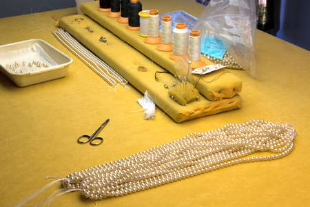 Manacor ( Mallorca ), Spain - August 10, 2016: A necklace in a factory shop in Manacor where are make the famous Majorica pearls, Mallorca, Balearic Islands, Spain.のeditorial素材