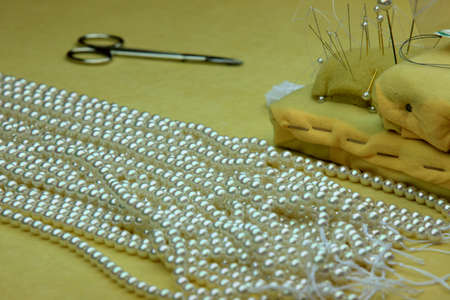 Manacor ( Mallorca ), Spain - August 10, 2016: A necklace in a factory shop in Manacor where are make the famous Majorica pearls, Mallorca, Balearic Islands, Spain.のeditorial素材