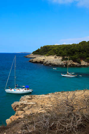 Es Migjorn Gran, Menorca / Spain - June 25, 2016: The Escorxada bay, Es Migjorn Gran, Menorca, Balearic Islands, Spainのeditorial素材