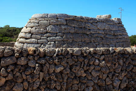 Ciutadela, Menorca / Spain - June 25, 2016: The Naveta des Tudons Talaiot culture prehistoric burial site, Ciutadela, Menorca, Balearic Islands, Spainのeditorial素材