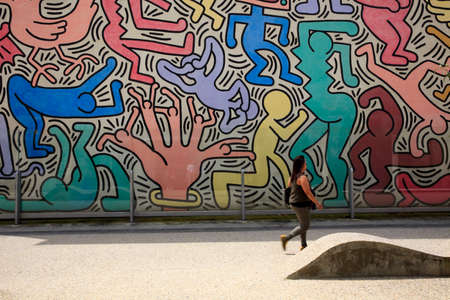 Pisa (PI), Italy - June 10, 2017: The Pisa's Mural (1989) Keith Haring - painted on the south wall of the Church of St Anthony, Pisa, Tuscany, Italy, Europeのeditorial素材