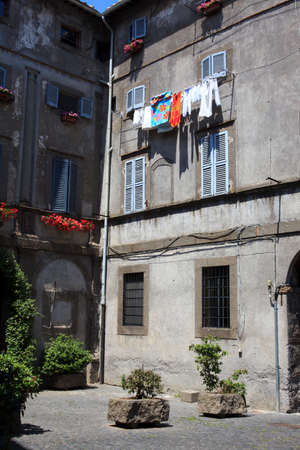 Bagnaia (VT), Italy - May 10, 2016: A typical road and houses in centre of Bagnaia village, Viterbo, Lazio, Italyのeditorial素材