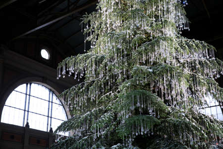 Zurich / Switzerland - November 25, 2018: A giant Christmas tree, draped with Swarovski jewelery, main attraction of Zurich's Christmas market at Zurich train station, Zurich, Switzerland, Europeのeditorial素材