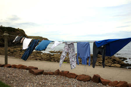 Pennan village (Scotland), UK - August 01, 2018: Loundry drying int Pennan village, Fraserburgh, Scotland, Highlands, United Kingdomのeditorial素材