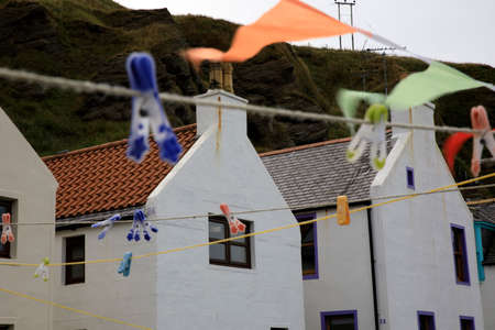 Pennan village (Scotland), UK - August 01, 2018: Houses in Pennan village, Fraserburgh, Scotland, Highlands, United Kingdomのeditorial素材