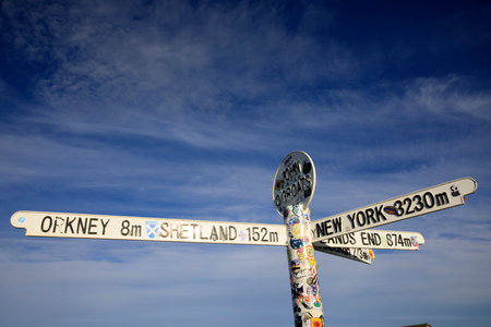 John O'Groats (Scotland), UK - August 04, 2018: Multi directional signpost at John O'Groats area,...