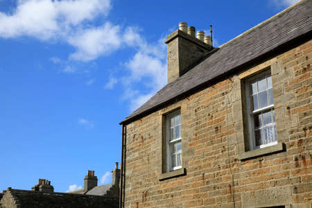 Margaret's Hope - Orkney (Scotland), UK - August 10, 2018: Typical stone house in St Margaret's Hope village, Orkney, Scotland, Highlands, United Kingdomのeditorial素材