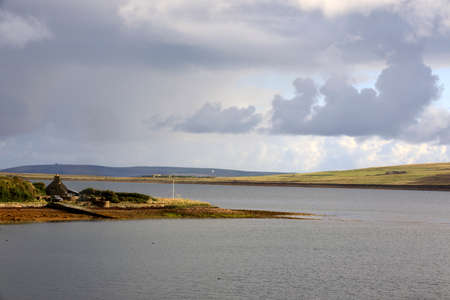Scapa Flow - Orkney (Scotland), UK - August 11, 2018: Landscape near harbour of Scapa Flow, Orkney, Scotland, Highlands, United Kingdomのeditorial素材
