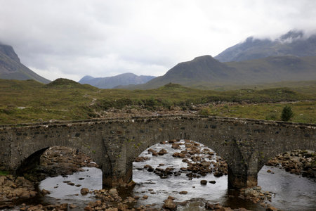 Sligachan - Skye Island (Scotland), UK - August 14, 2018: Sligachan Old Bridge looking towards the...
